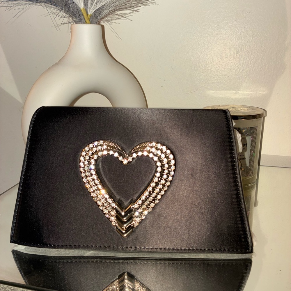 Elegant Black Clutch with Heart Embellishment